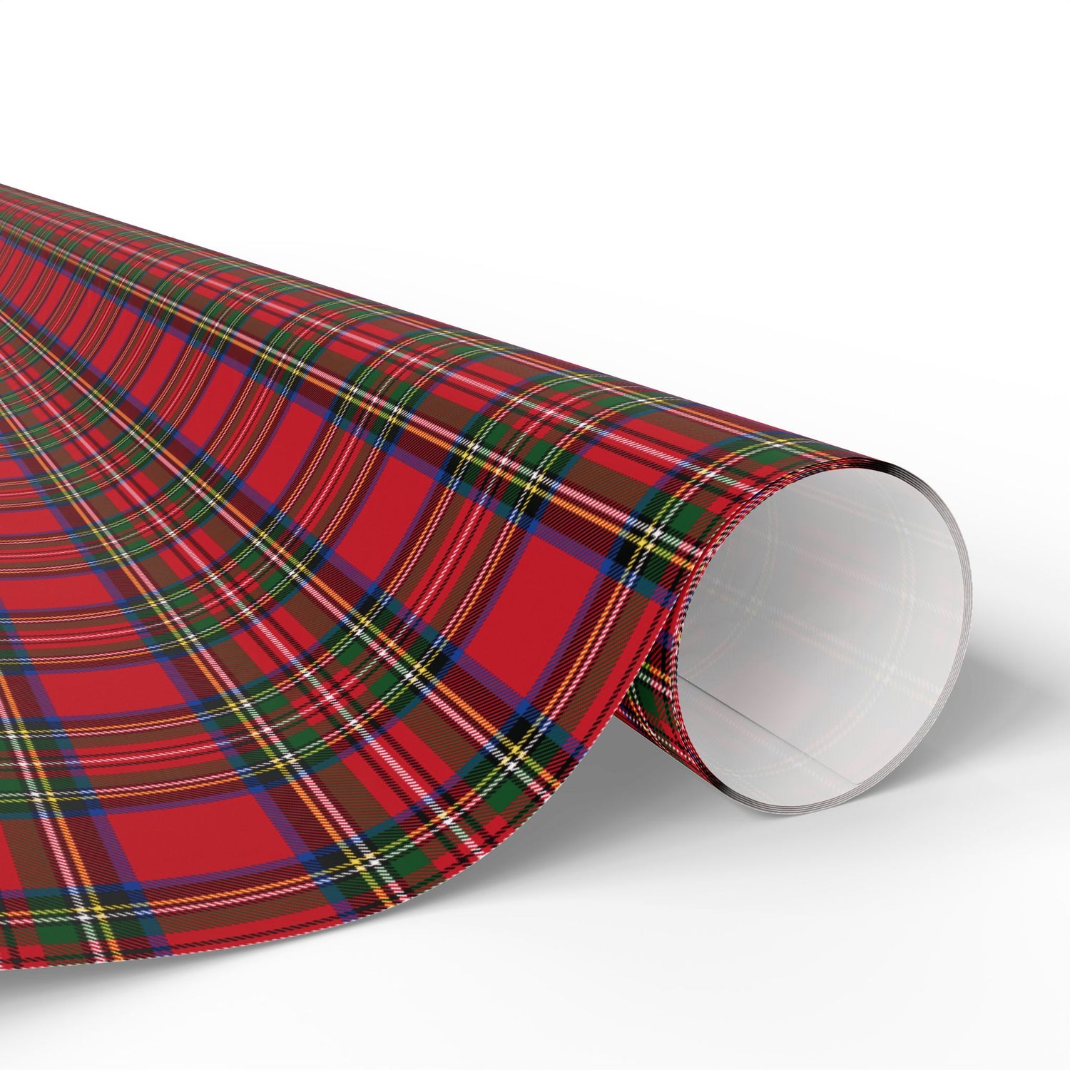 Roll of red plaid wrapping paper on a white background