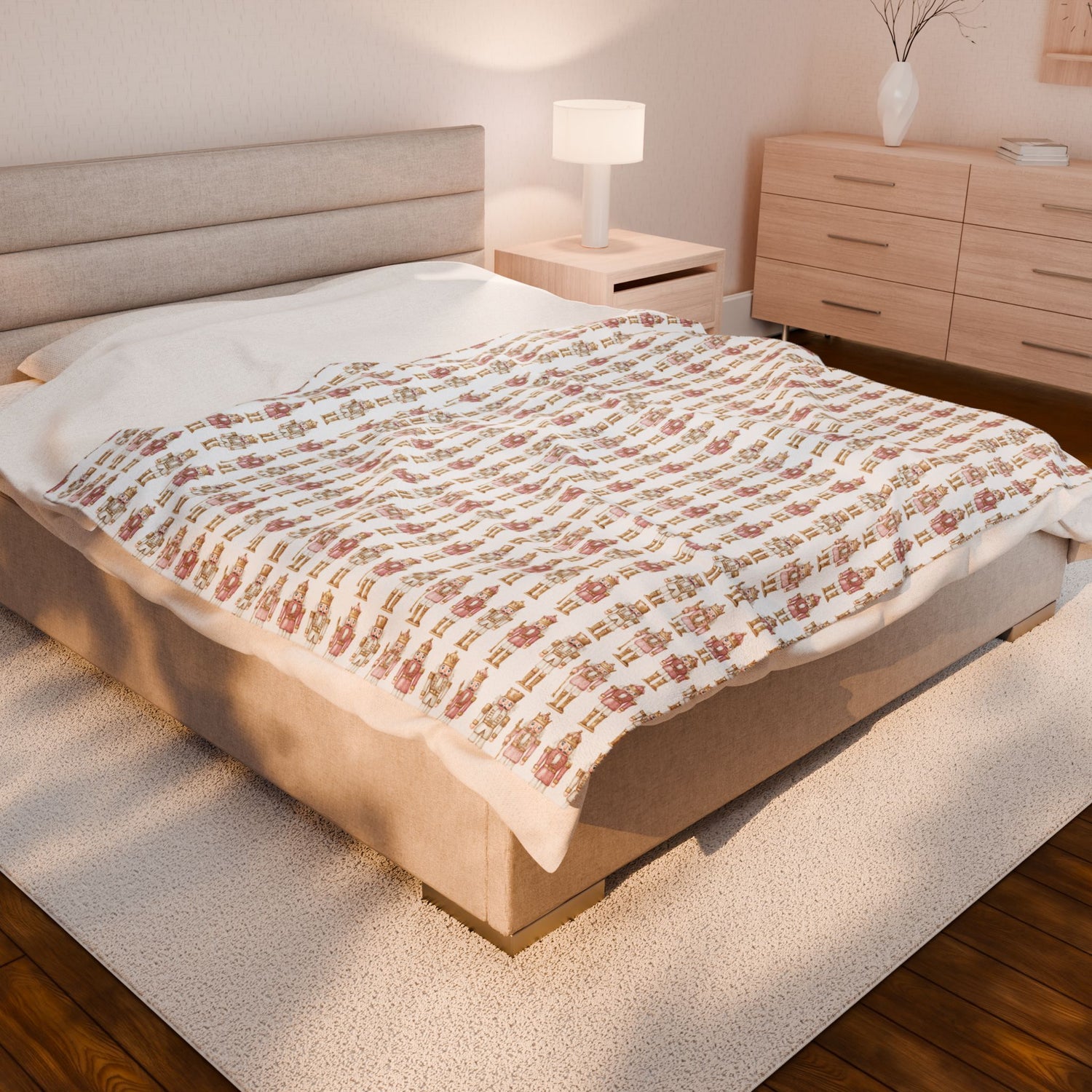 Bed with floral blanket in a bedroom setting
