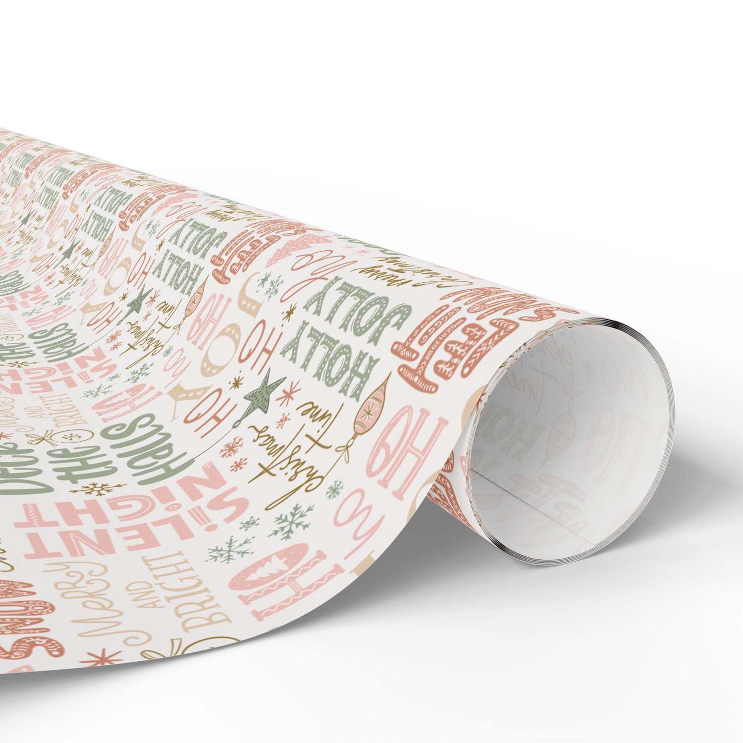 Roll of Christmas-themed wrapping paper with festive text on a white background