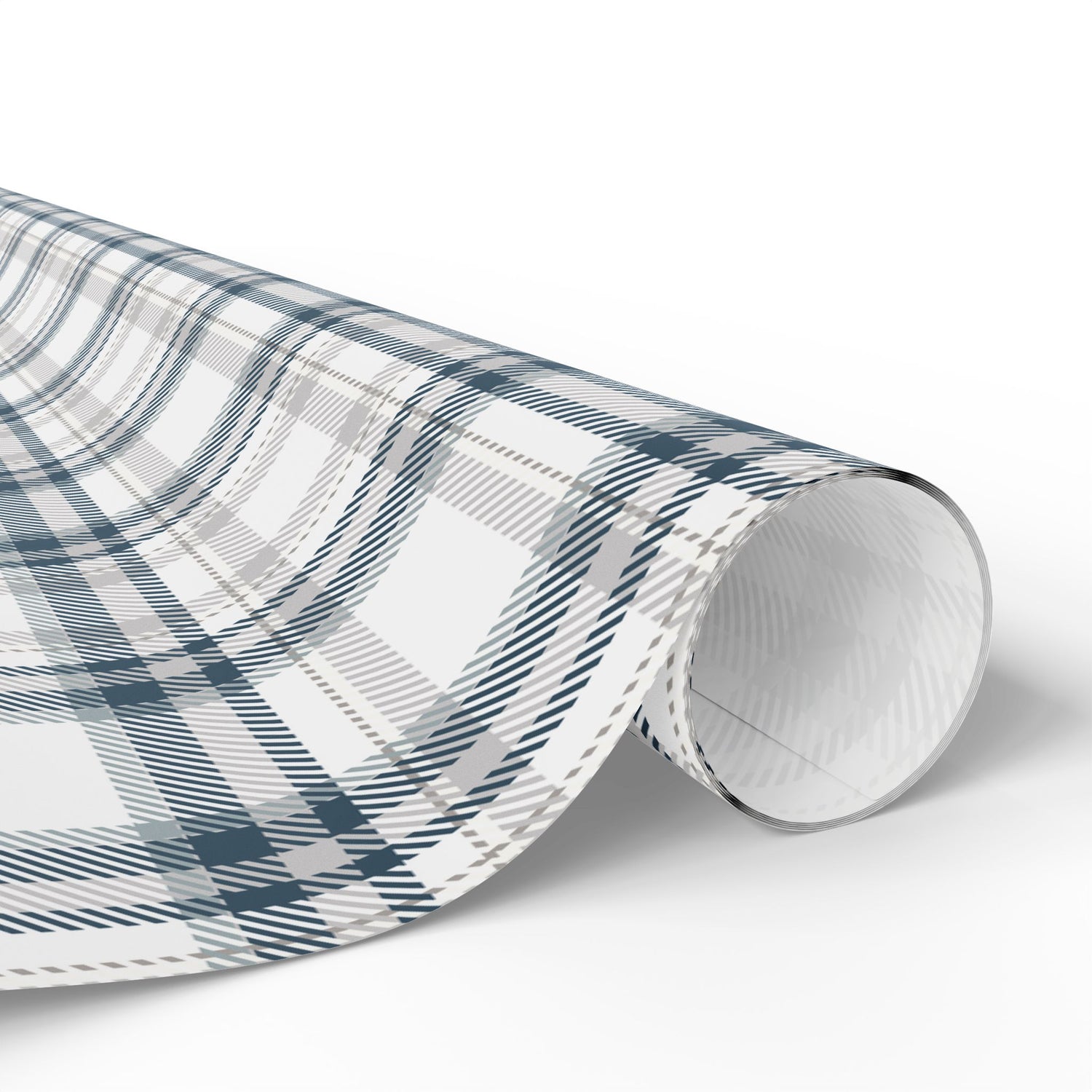 Roll of plaid patterned paper on a white background