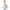 Man carrying a floral-patterned bag on a white background