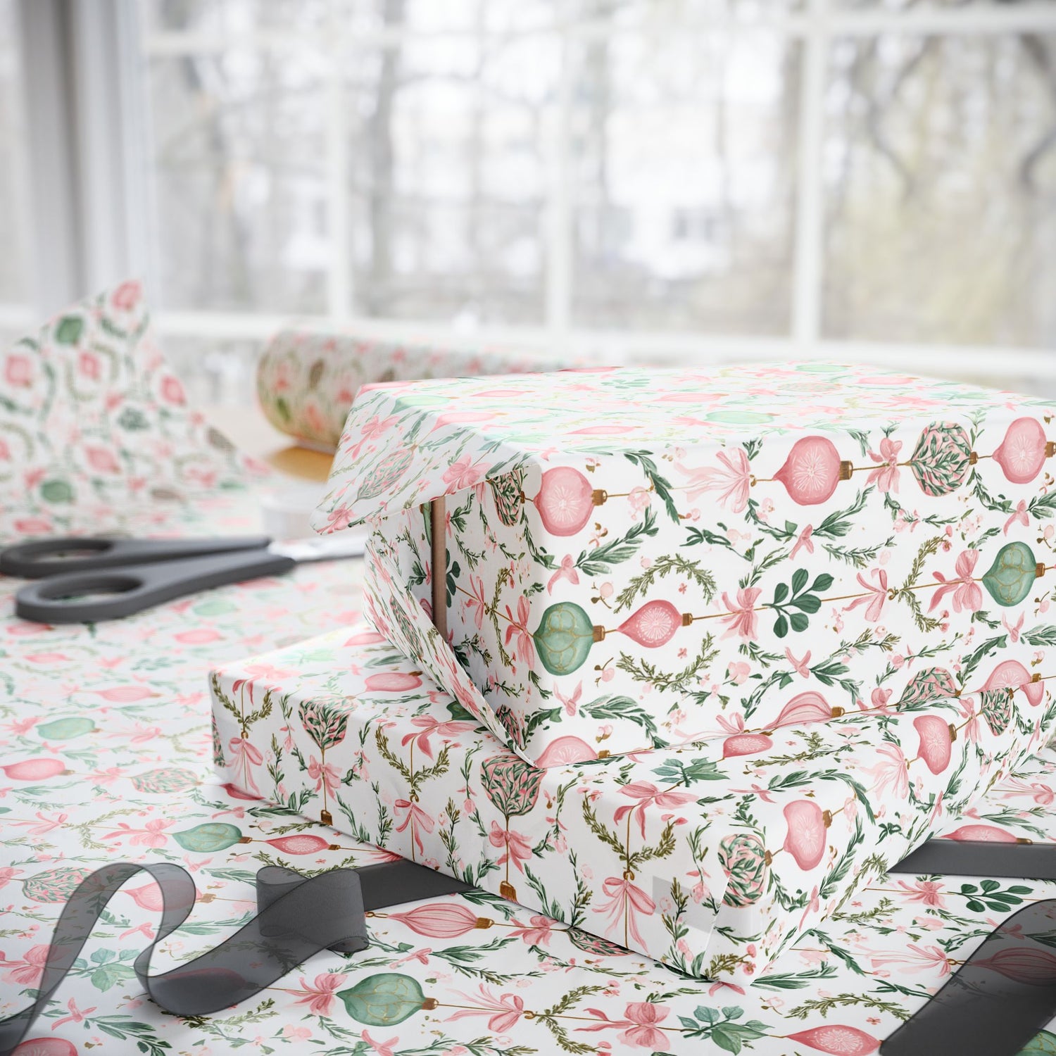 Gift boxes with floral pattern on a table with scissors