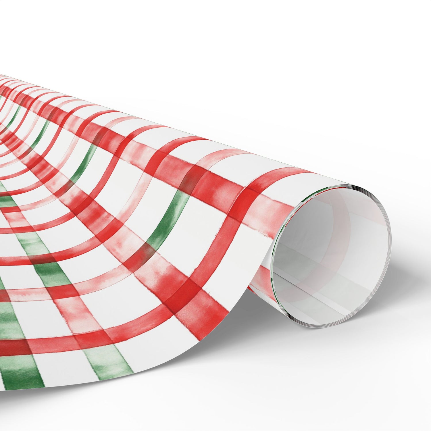 Roll of red, green, and white plaid patterned paper on a white background